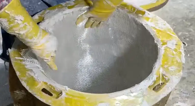 The manufacturing process of custom GRC planter boxes showing the cement and alkali-resistant glass fiber matrix